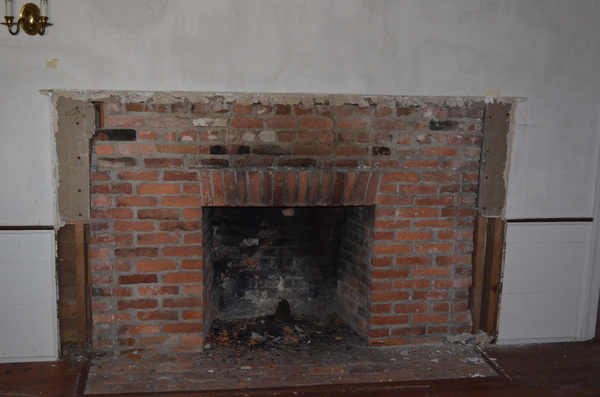 The fireplace after the mantel was stolen. ERIN MCKINLEY
