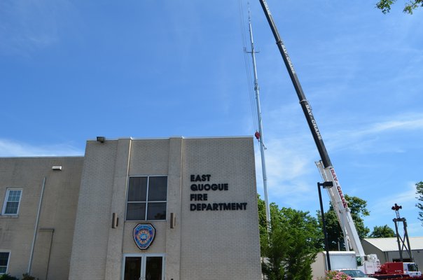 The antenna and pole were installed behind the East Quogue Fire Department on Friday. Alexa Gorman