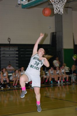 Hailey Daleo of Westhampton Beach goes in all alone for a layup. ALEX FERRAIUOLO