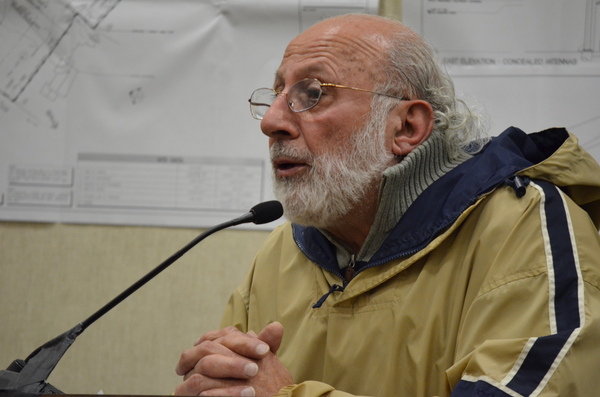 Planning Board member Philip Keith listens to questions about the proposed cell phone tower in East Quogue. 