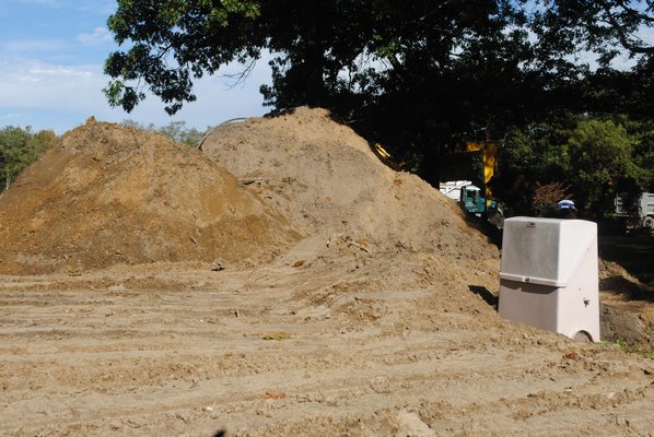 A dirt mound on Montauk Highway where the old VFW Post in Quogue is being demolished. AMANDA BERNOCCO