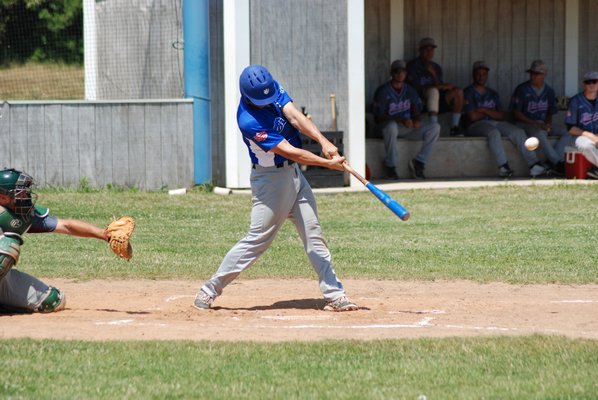 Breakers shortstop Kevin Kolesar (Queens College) makes a throw to first base for an out. DREW BUDD