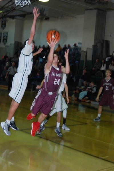 East Hampton's Jack Reese tries to get inside for two points. DREW BUDD