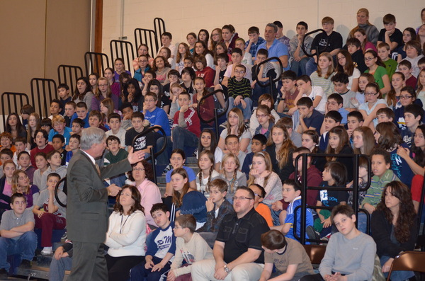 Eastport Elementary students listen to a presentation by Detective Rory Forrestal of the computer crimes unit. 