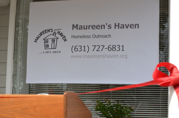  cut the ribbon for the new Maureen's Haven day center. 