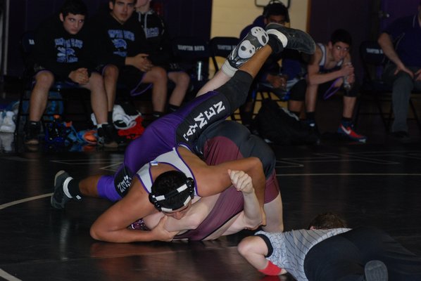  Espinosa took Mendez down to the mat with a headlock and pinned him. DREW BUDD