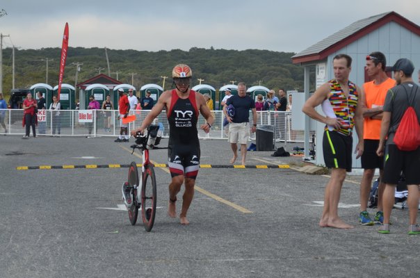 Scenes from the Mighty Hamptons Triathlon in Sag Harbor on Sunday morning. KIM COVELL