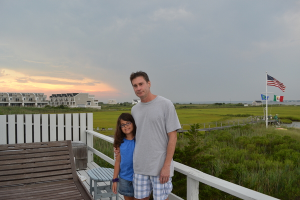Westhampton Beach resident Jonathan Pearlroth stands with his daughter Alina