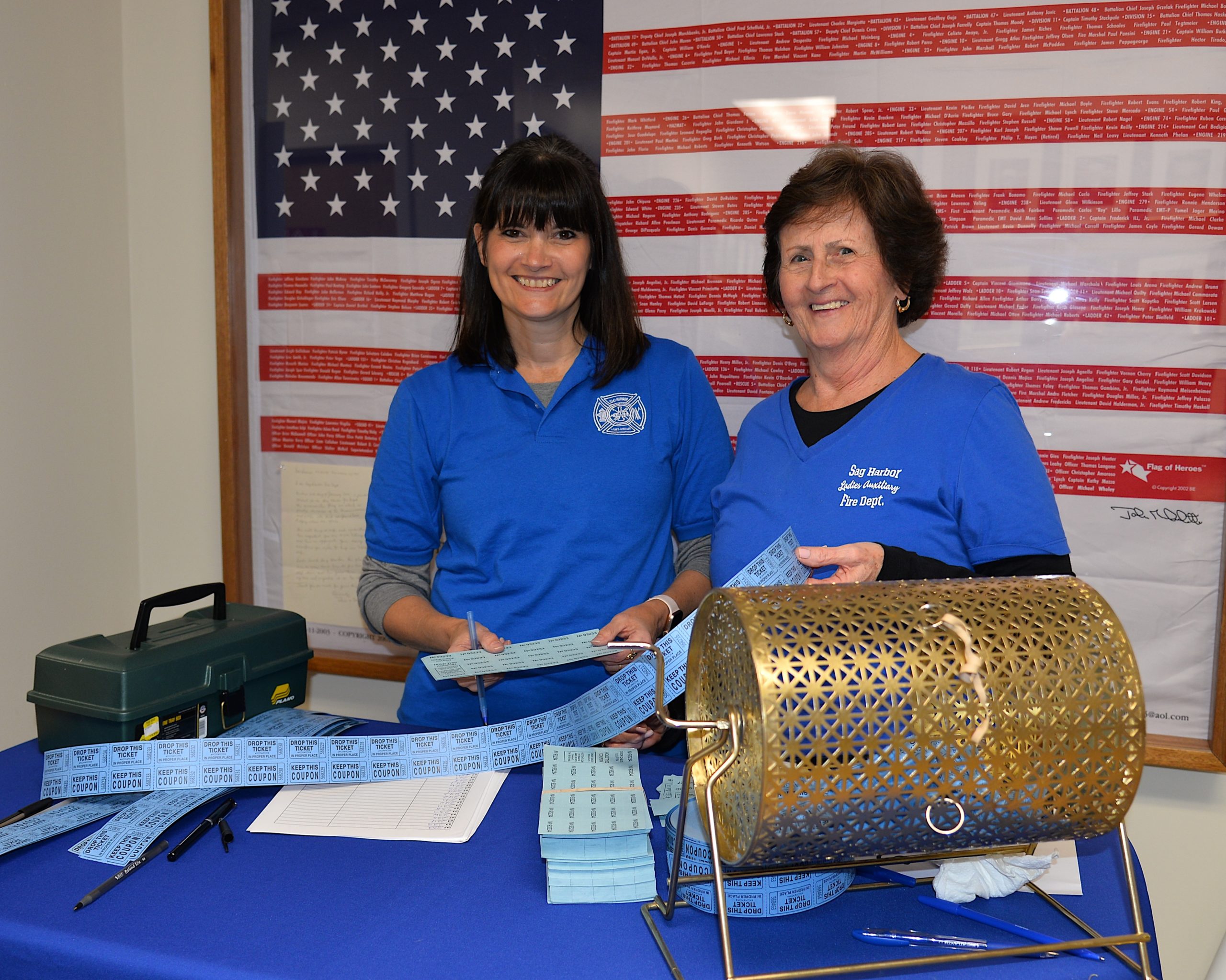 The Ladies Auxilliary of the Sag Harbor Fire Department hosted a holiday sale on Friday. Jody Miller and Betsy Remkus of the Ladies Auxilliary were in charge of the raffle table. KYRIL BROMLEY 