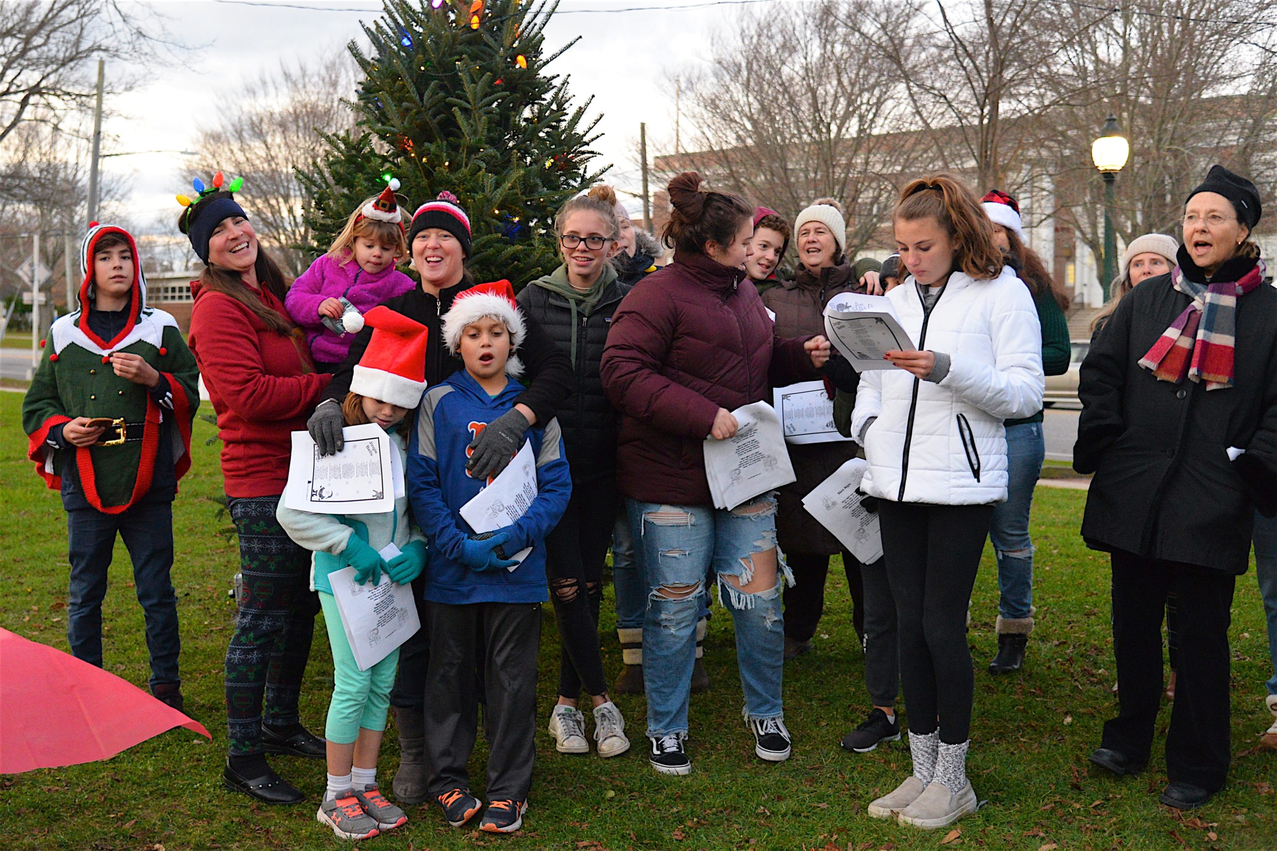 Members of the East Hampton Presbyterian Churc set out for a stroll on Sunday to sing Christmas carols in the village business district. KYRIL BROMLEY