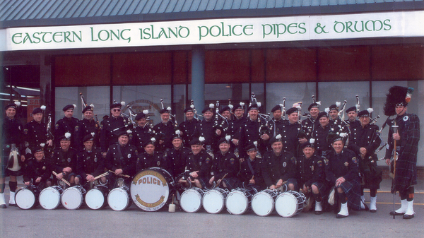 The Eastern Long Island Police Pipes and Drums marching at a Long Island Ducks game on 