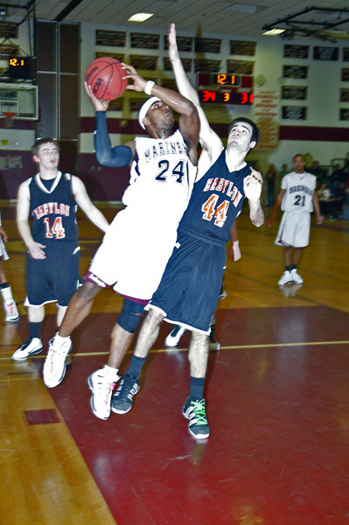 Onajja Browning goes up for two in the Mariners win over Babylon on Friday night. 