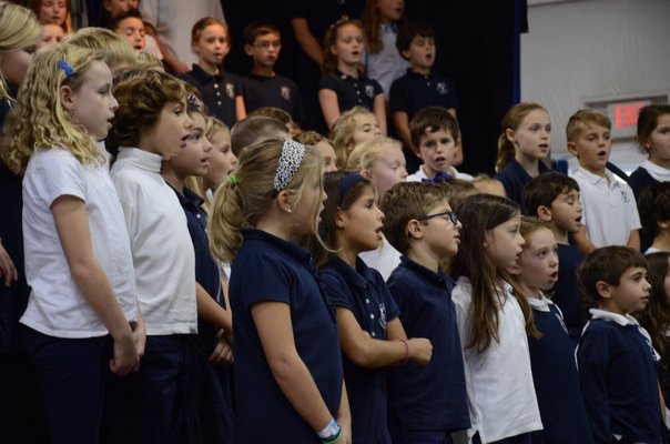 Veterans and members of the U.S. Coast Guard were honored during the Raynor Country Day School's special assembly in Speonk on Thursday