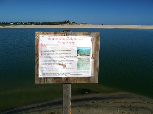Signs were posted last year at Georgica Pond. LAURA WEIR
