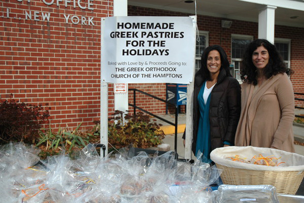 Anastasia Gavalas and Maria Eftimiades of the Greek Orthodox Church of the Hamptons sold Greek pastries just in time for Thanksgiving in front of the Bridgehampton Post Office on Saturday.