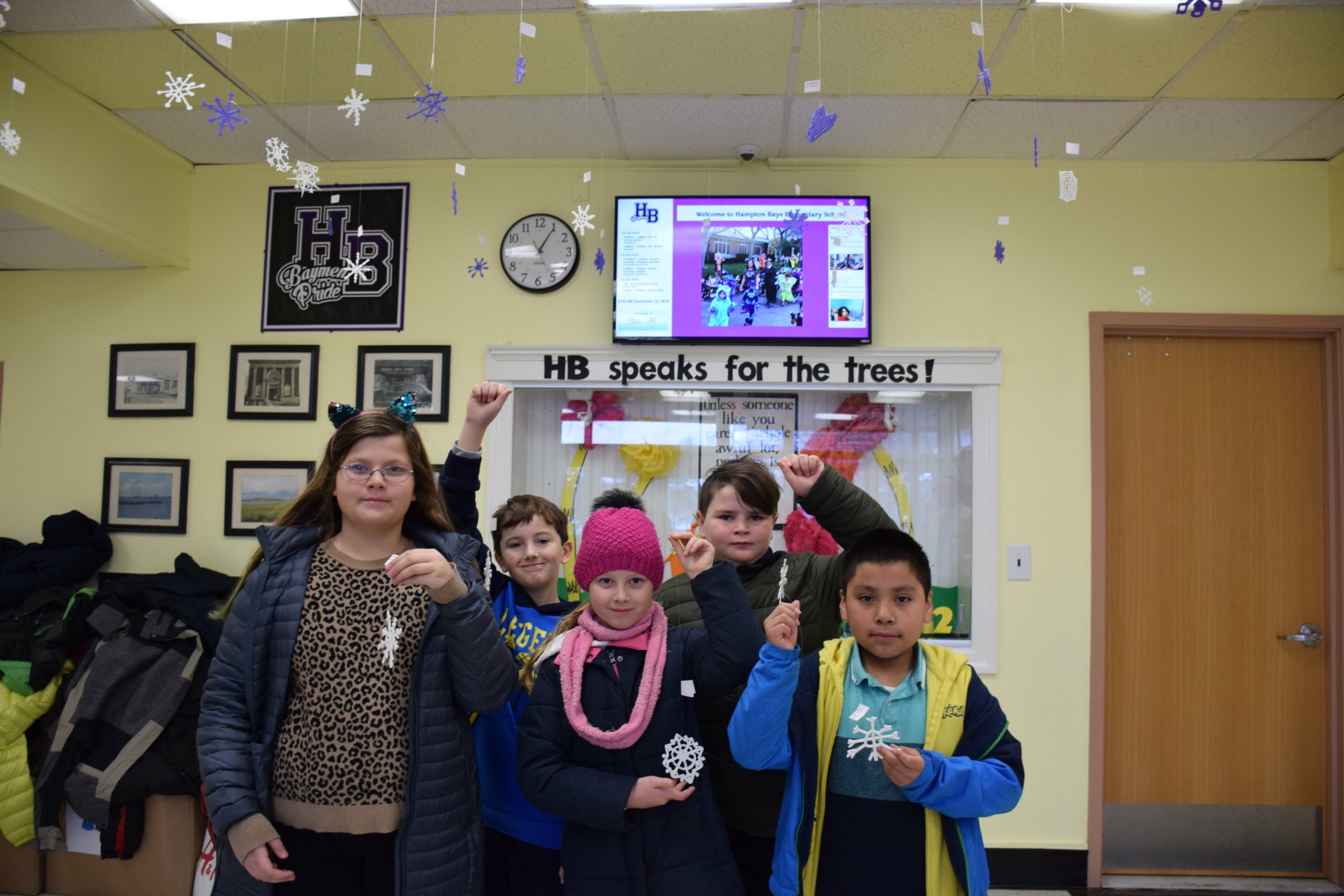 Hampton Bays Elementary School fourth-graders used 3D printing technology in their STEM classes to design symmetrical snowflakes. The 152 individually designed works of art are displayed in the main hallway of the school.