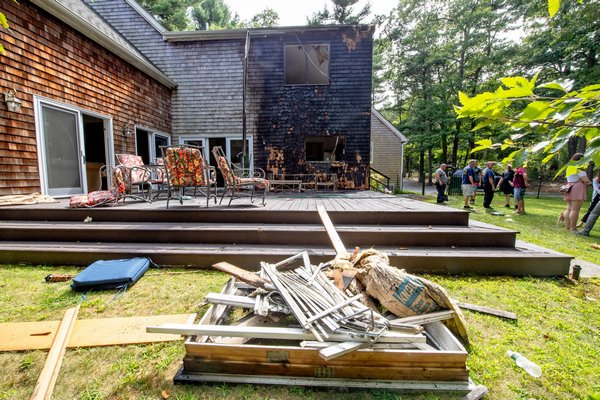  2019 members of the East Hampton Fire Department were called to extinguish a working deck fire at 225 Old Northwest Road. MICHAEL HELLER/EAST HAMPTON FIRE DEPARTMENT