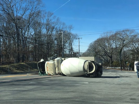 A cement truck rolled over in front of Cromer's Market in Noyac. COURTESY KELLIE OKUNEWICZ