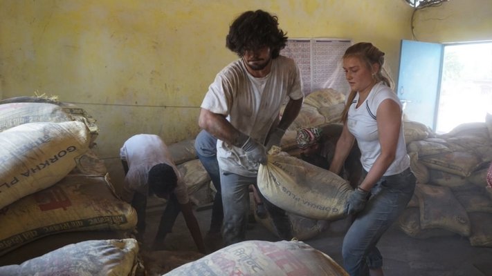 Vincenzo Salsedo and Sophia Swanson working to build the school in Nepal.  COURTESY WILLIAM BARBOUR
