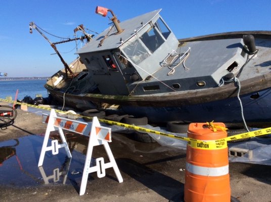 A sinking 40-foot fishing vessel was pulled from the Shinnecock commercial fishing doc