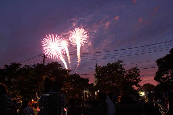 Westhampton Beach crowds celebrated the Fourth of July Sunday night by watching a fireworks show sponsored by the Westhampton Country Club. BY NEIL SALVAGGIO