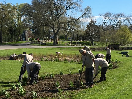 Workers planted a demonstration garden on the village green in East Hampton this week. KYRIL BROMLEY