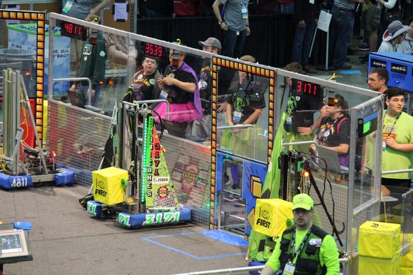 The Hurricanes’ robot competes in qualifier matches at the FIRST Robotics World Championships. JOSEPH COMMISSO