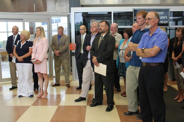  speaks at the opening of the Suffolk County Historical Society exhibit titled