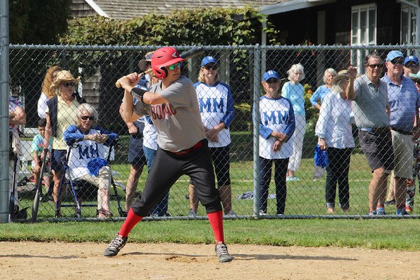 Recreating a 100-year-old local tradition, the Maidstone Mugwumps (a team comprised of Maidstone Club members and family) did battle on the baseball diamond with The Bonac Native Sons and Daughters on Sunday at Herrick Park. Hugh King was the emcee/play-by-play announcer. The game was a fundraiser sponsored by the East Hampton Historical Farm Museum. The game ended with the Bonackers victorious, 4-3, having cut down the potential tying run at the plate to end the game. KYRIL BROMLEY PHOTOS