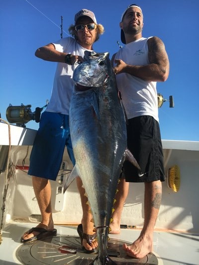 Capt. Harry Garrecht and Nick Schneider heft the nice bluefin tuna they caught aboard Garrecht's charter boat Breakwater off Montauk last week.