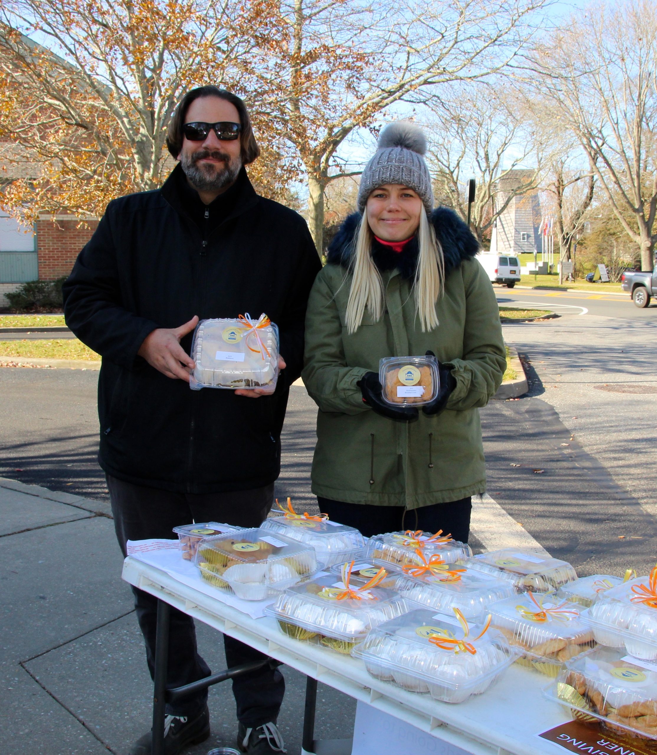 Greek pastries from the Greek Orthodox Church of the Hamptons were for sale outside the East Hampton post office on Saturday.  Father Constantine Lazarakis and Afrodite Stergiou manned the table. KYRIL BROMLEY 