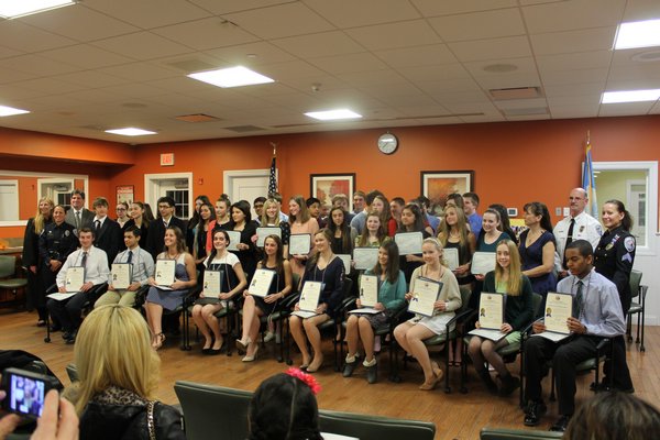 Southampton Town Justice Barbara Wilson swore 48 high school students in to the eighth annual Southampton Youth Court on Monday night in Flanders. MEIGAN ROCCO