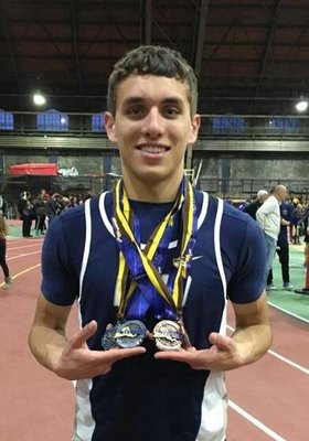 Luke Lafferty shows off his hardware from the New York State Indoor Track Championships this past weekend.
