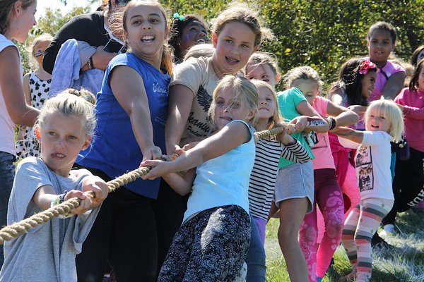 Kids compete in the tug-of-war.