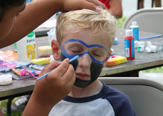 Owen Rodgers has his face painted.