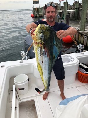 Robert Godley holding his winning catch. COURTESY BIG BROTHERS BIG SISTERS