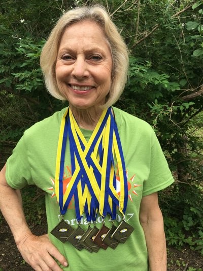 Joyce Flynn and her six gold medals and one bronze at the Empire State Senior Games. Dan Flynn