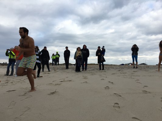 The Westhampton Beach High School student government held its annual Polar Bear Plunge at Rogers Beach on Saturday.
