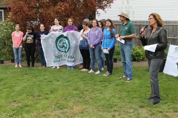 Westhampton Beach Trustee Patricia DiBenedetto hosted a tree planting celebration in honor of Arbor Day in the village on Friday afternoon. KYLE CAMPBELL