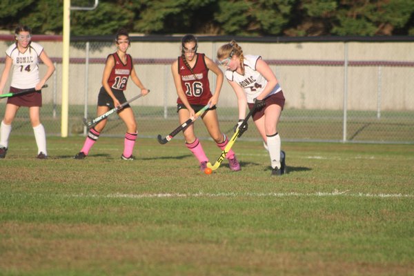 East Hampton's Katie McGovern controls the ball while Southampton's Shelby Pierson looks on. CAILIN RILEY