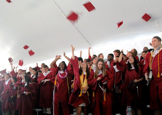 The Class of 2014 throw their mortor boards in the air.