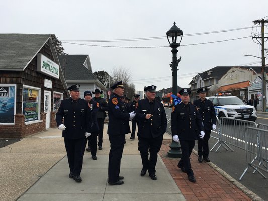 Suffolk County police officers in Hampton Bays Wednesday morning for the funeral service of New York City Police Detective Brian Simonsen. DANA SHAW