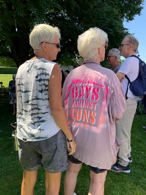 Protesters on the Water Mill Village Green on Friday during President Donald Trump's visit to the Hamptons.  KIM COVELL