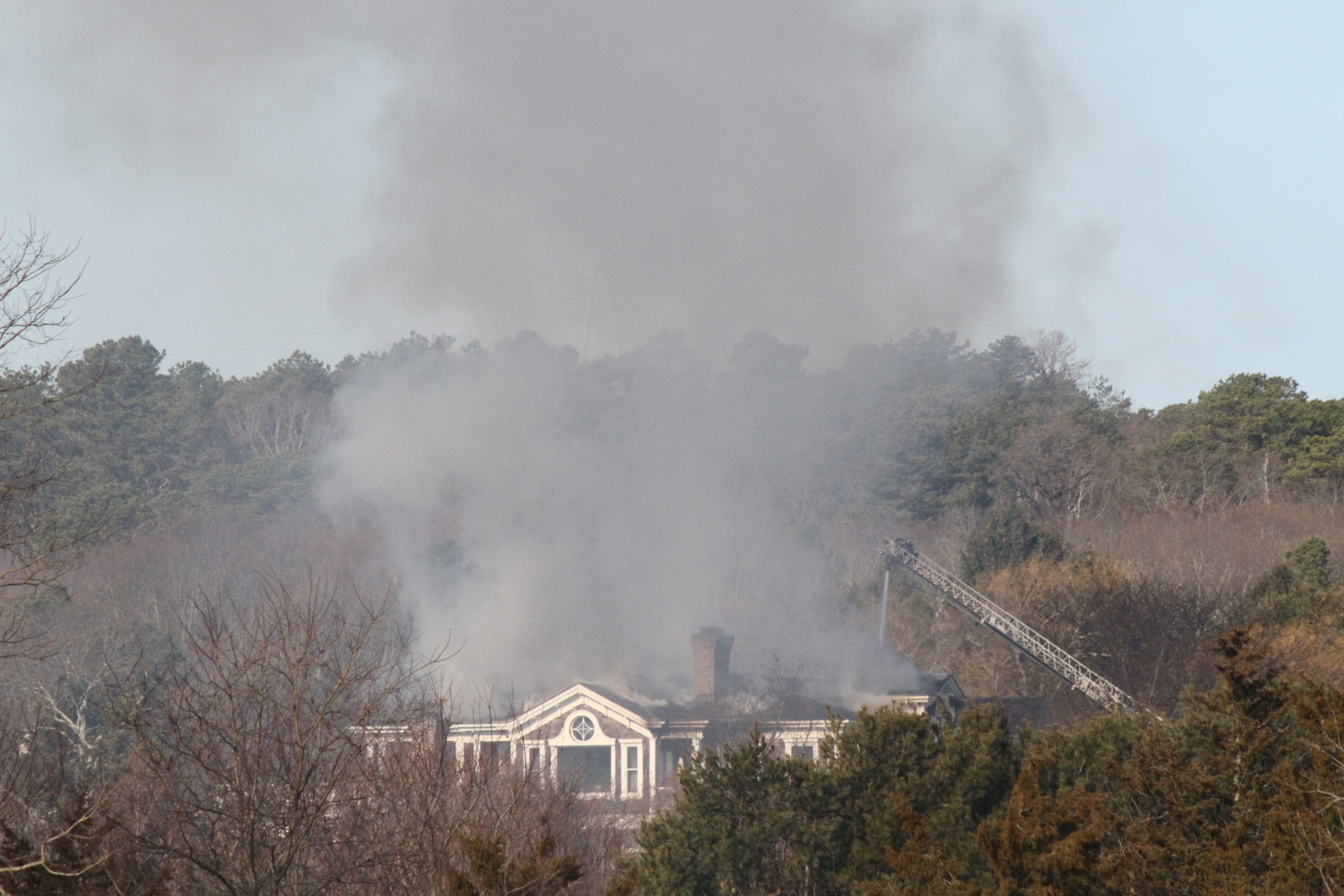Fire destroyed a Water Mill mansion on Saturday morning. The house was on Little Noyac Path, which does not have fire hydrants, forcing fire crews from throughout the South Fork to rely on tanker trucks to supply the water needed to fight the flames. 