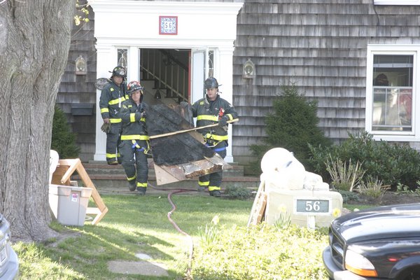 Firemen from East Hampton and Amagansett had to cut through the floor