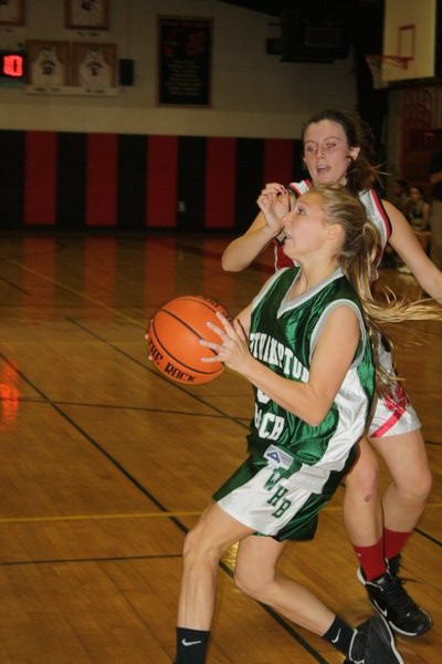 Lady Hurricane Kennedy Skala drives to the hoop in her team's win over Pierson. CAILIN RILEY