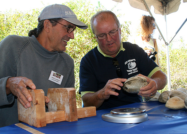 Kyle Paseka and Russell Drumm judged chowders at the Largest Clam Contest on Sunday. KYRIL BROMLEY