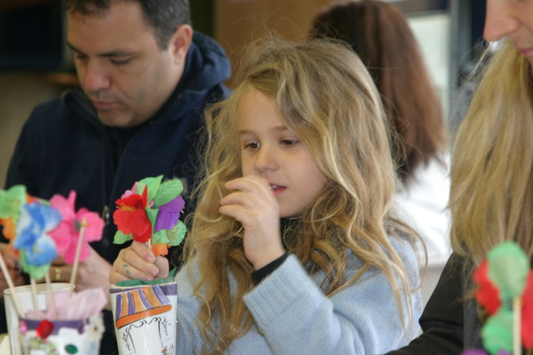  helped his mom make an Easter card at the Children's Museum of the East End on Saturday.