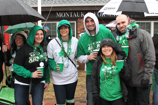 A little rain didn't dampen the spirits of those marching and cheering on the St. Patrick's Day parade in Montauk on Sunday. KYRIL BROMLEY