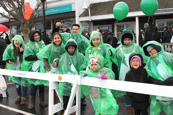 A little rain didn't dampen the spirits of those marching and cheering on the St. Patrick's Day parade in Montauk on Sunday. KYRIL BROMLEY